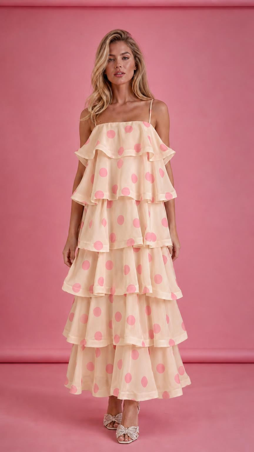 Model wearing beige polka dot tiered ruffle midi dress
