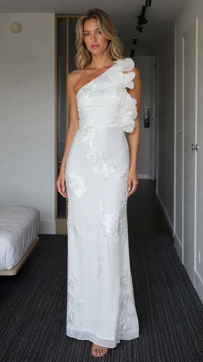 Front view of white one-shoulder ruffle maxi dress