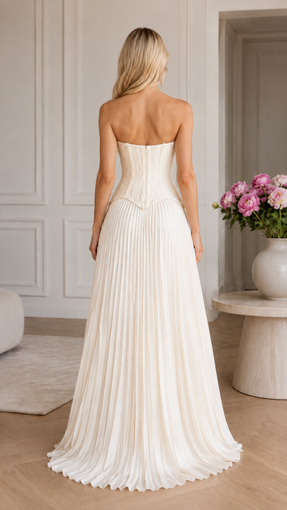 Back view of white strapless pleated long gown