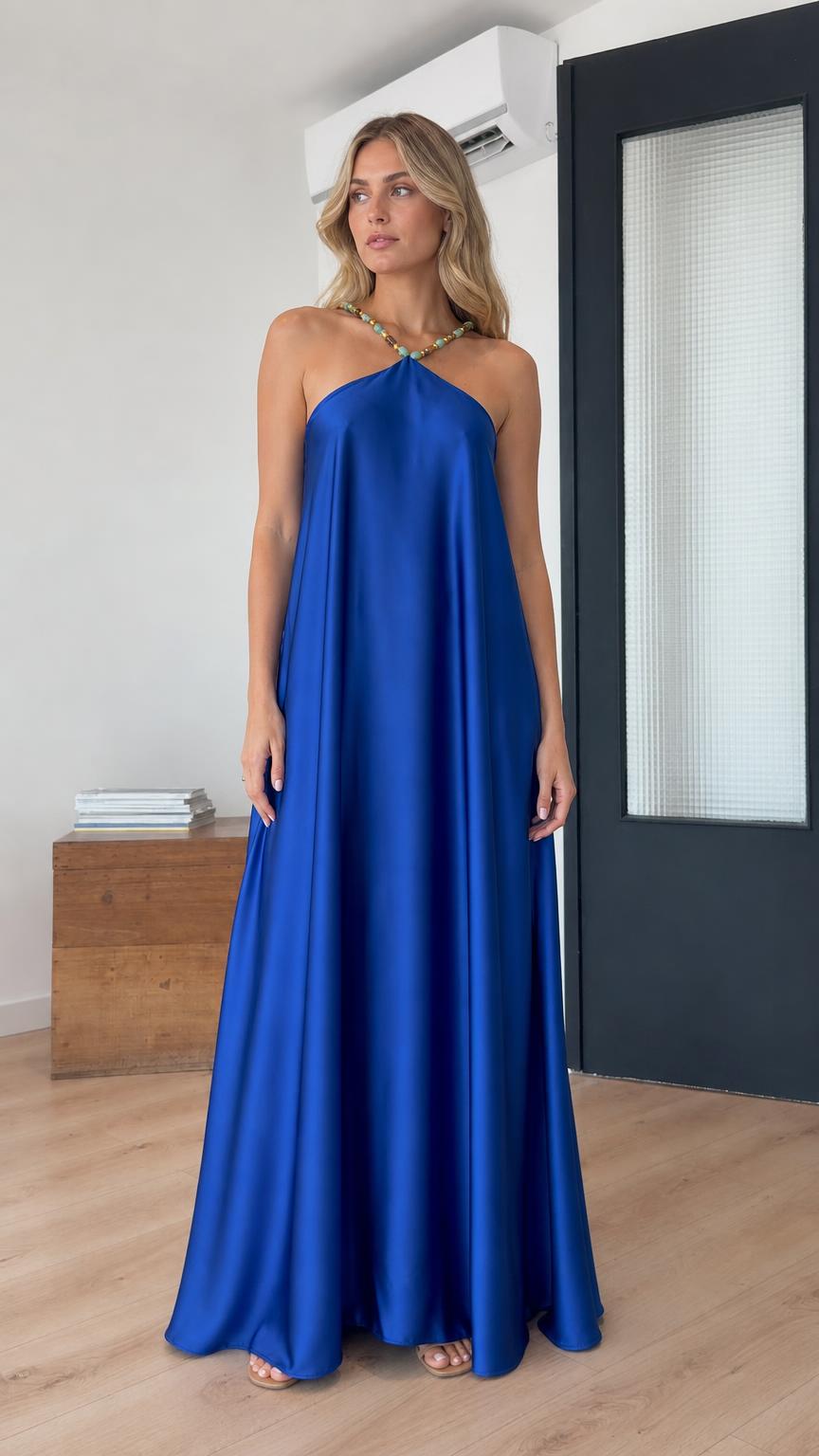 Front view of model wearing royal blue halter maxi dress