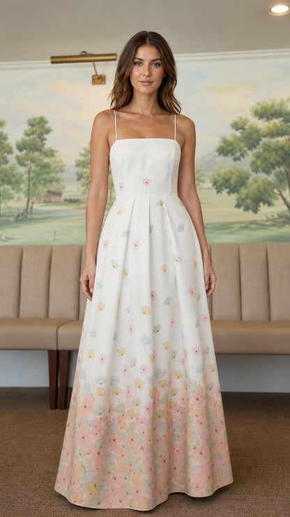 Front view of woman wearing white floral ombre maxi dress