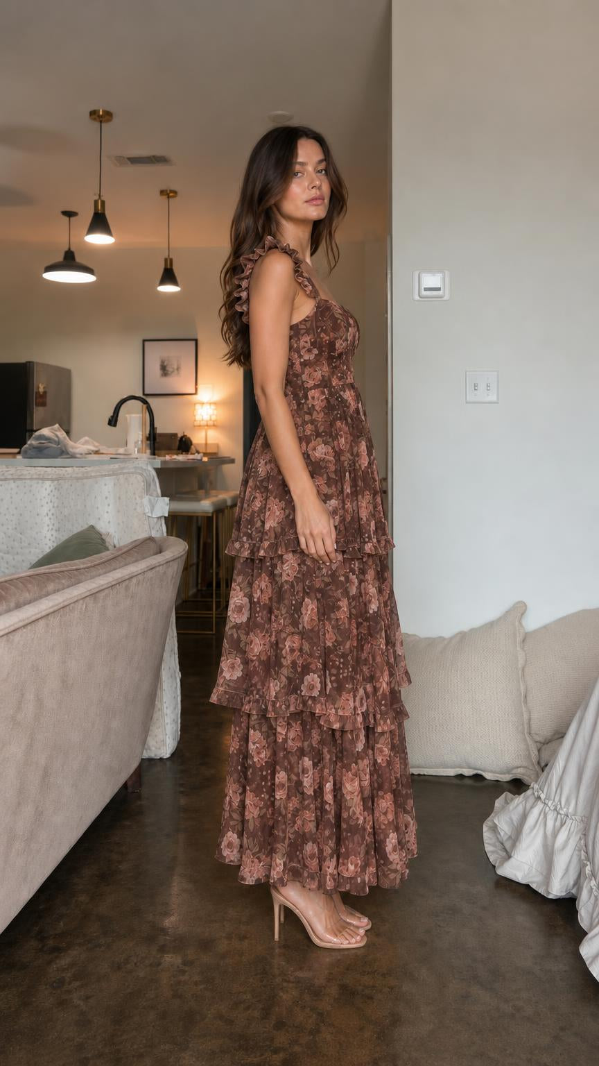 Side view of model wearing brown floral ruffle tiered maxi dress