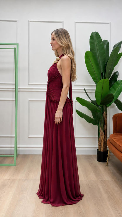 Side view of burgundy halter pleated maxi dress