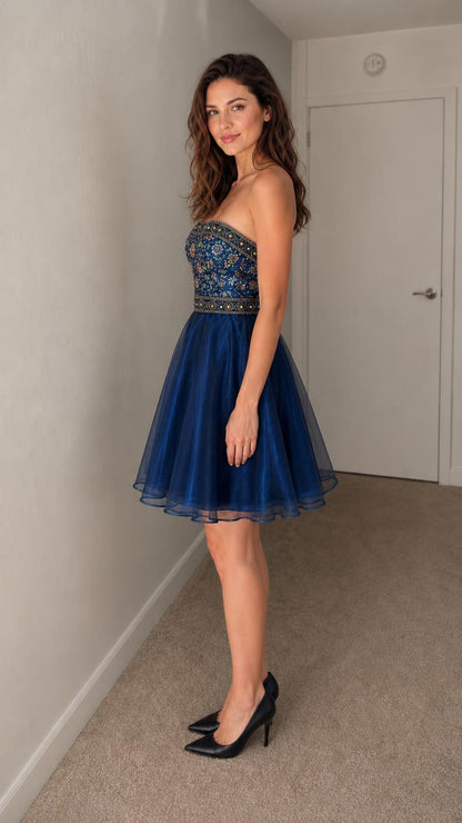 Side profile view of navy blue tulle mini dress