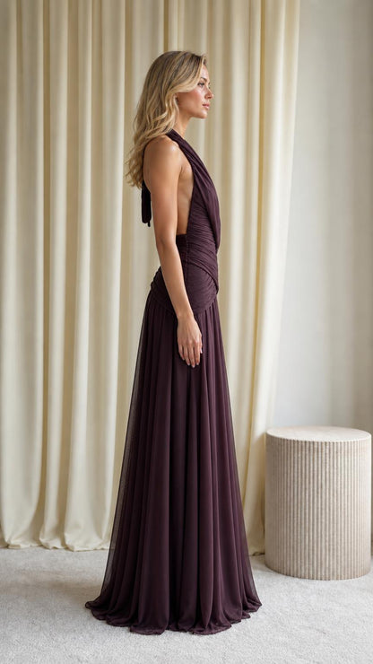 Side profile view of plum evening gown