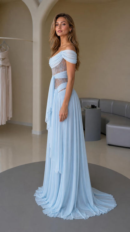Side profile of light blue evening gown with draped chiffon