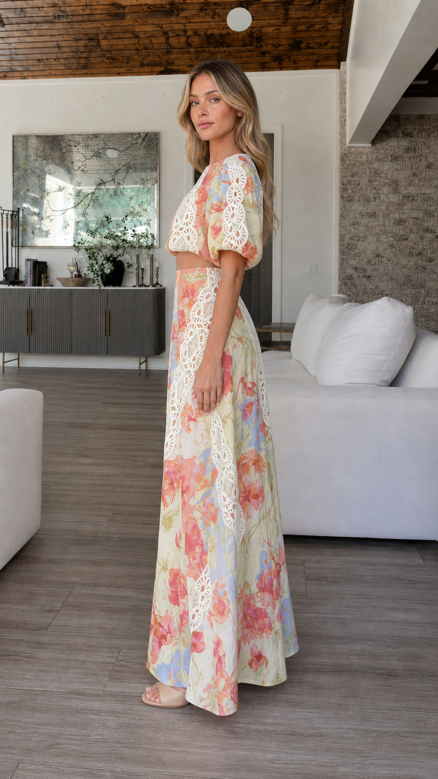 Side profile of model in multi-color floral two-piece set
