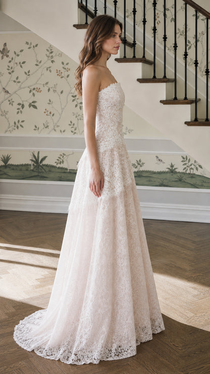Side profile view of champagne lace evening dress
