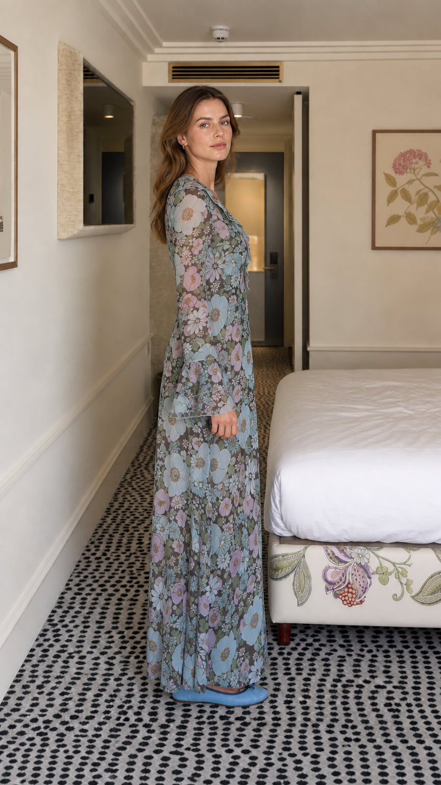 Side profile view of blue floral maxi dress