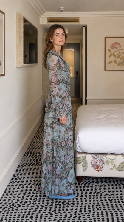 Side profile view of blue floral maxi dress