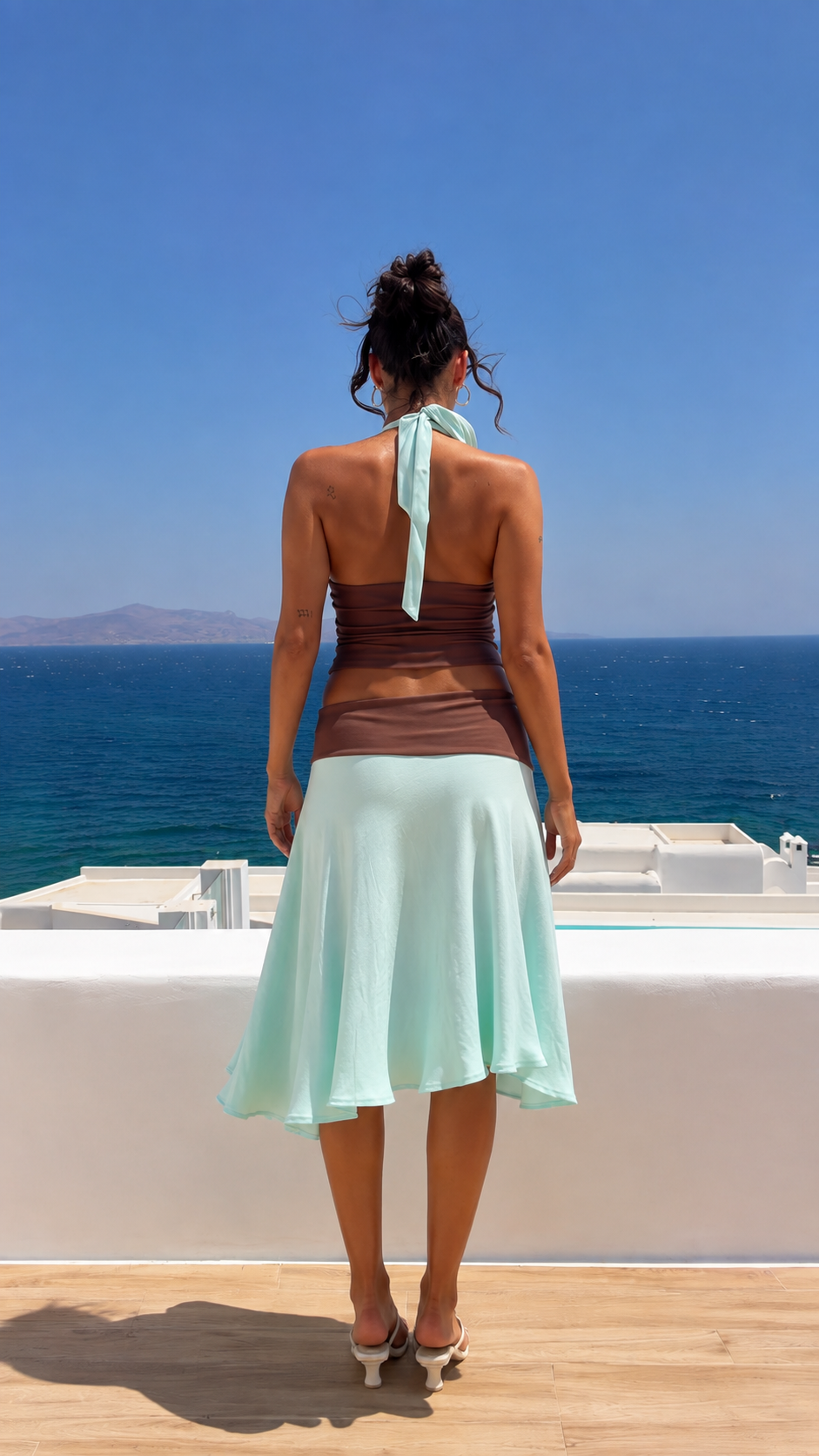 Back view of mint blue and brown two-piece set
