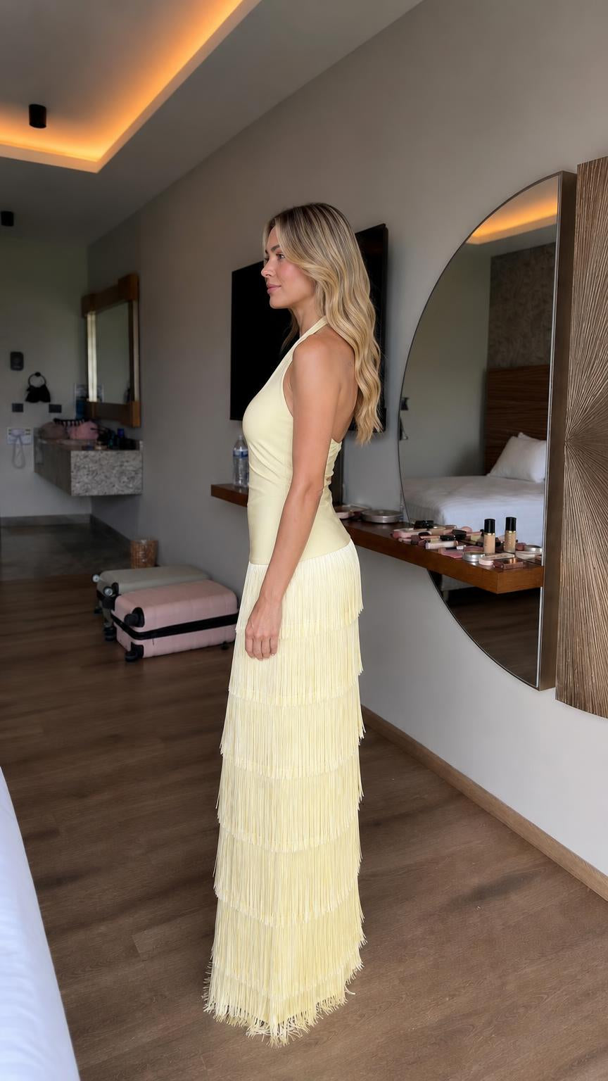 Side profile of model wearing Light Yellow fringe dress