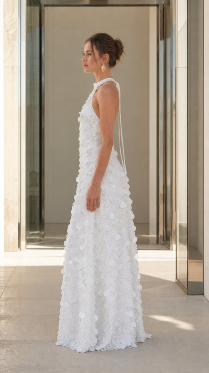 Side profile of White 3D floral applique maxi dress