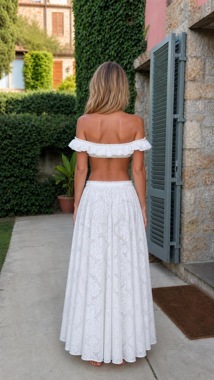 Back view of model in white lace matching set