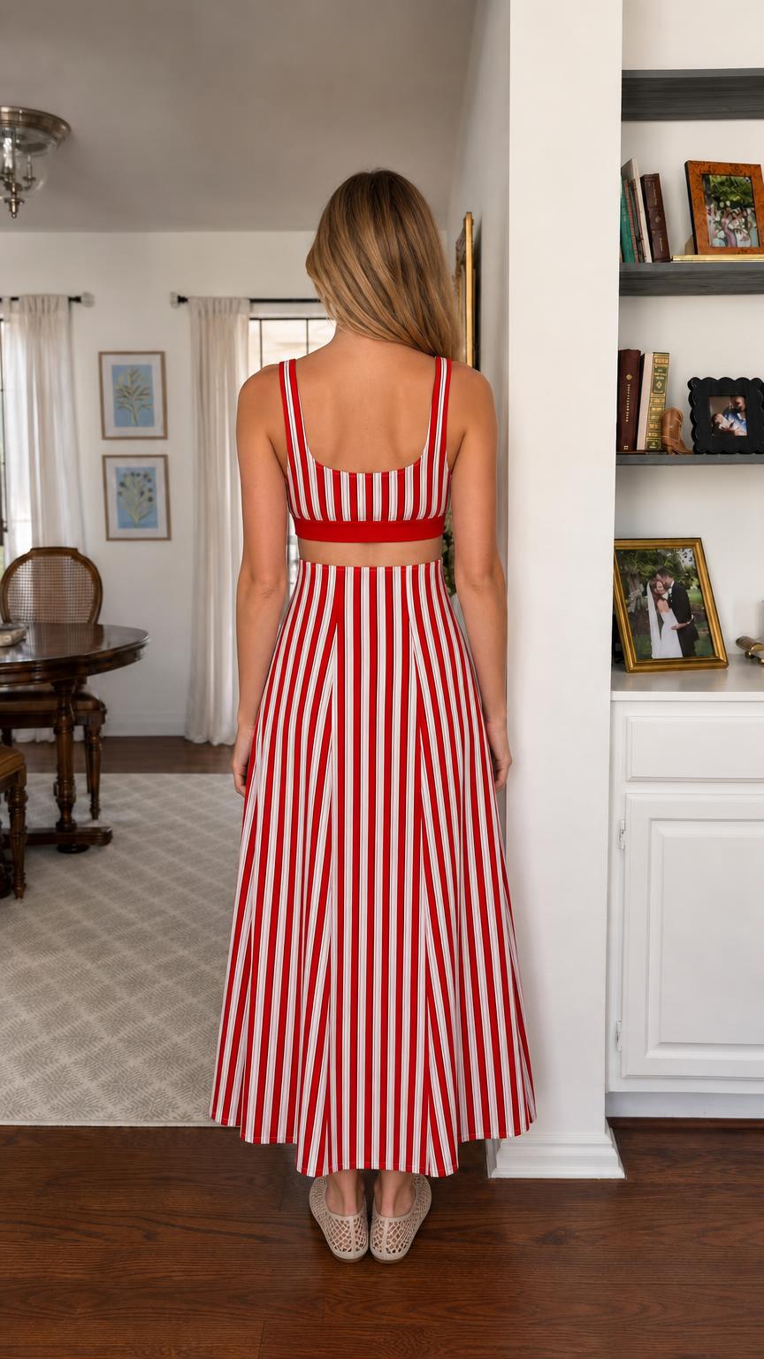 Back view of woman wearing red and white striped two-piece outfit