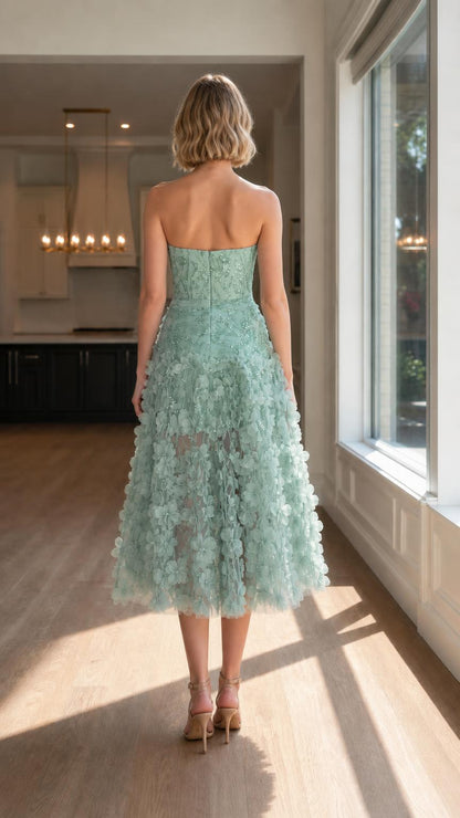 Back view of sage green strapless dress