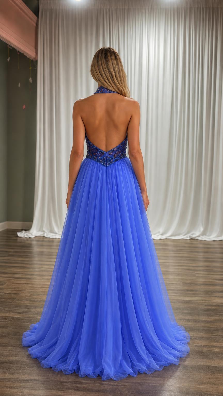 Back view showcasing open back design of blue gown