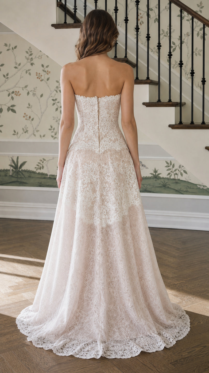 Back view showing zipper and train of champagne lace gown