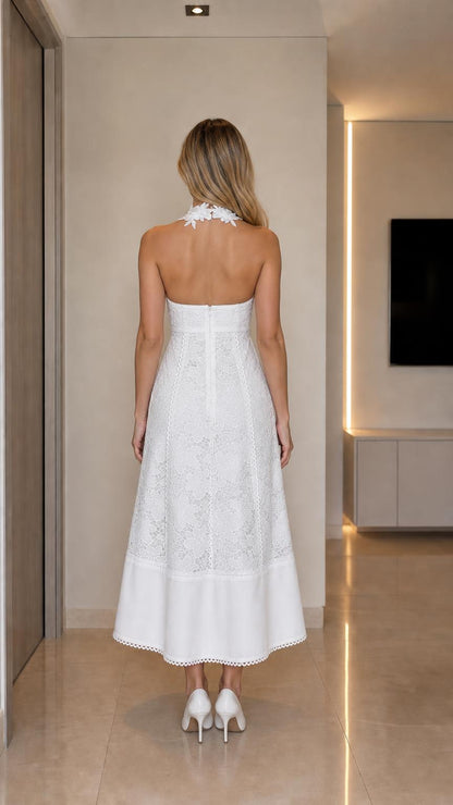 Back view showcasing open back design of white lace dress