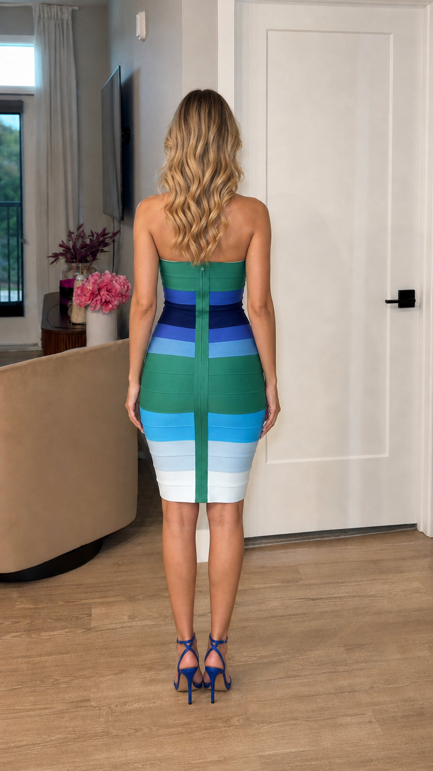 Back view showing zipper detail on blue multi bandage dress
