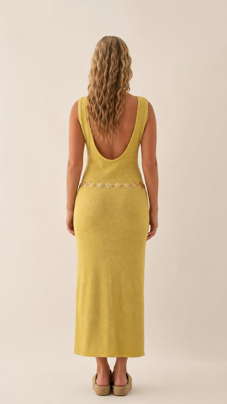 Back view showing scoop back of yellow midi dress