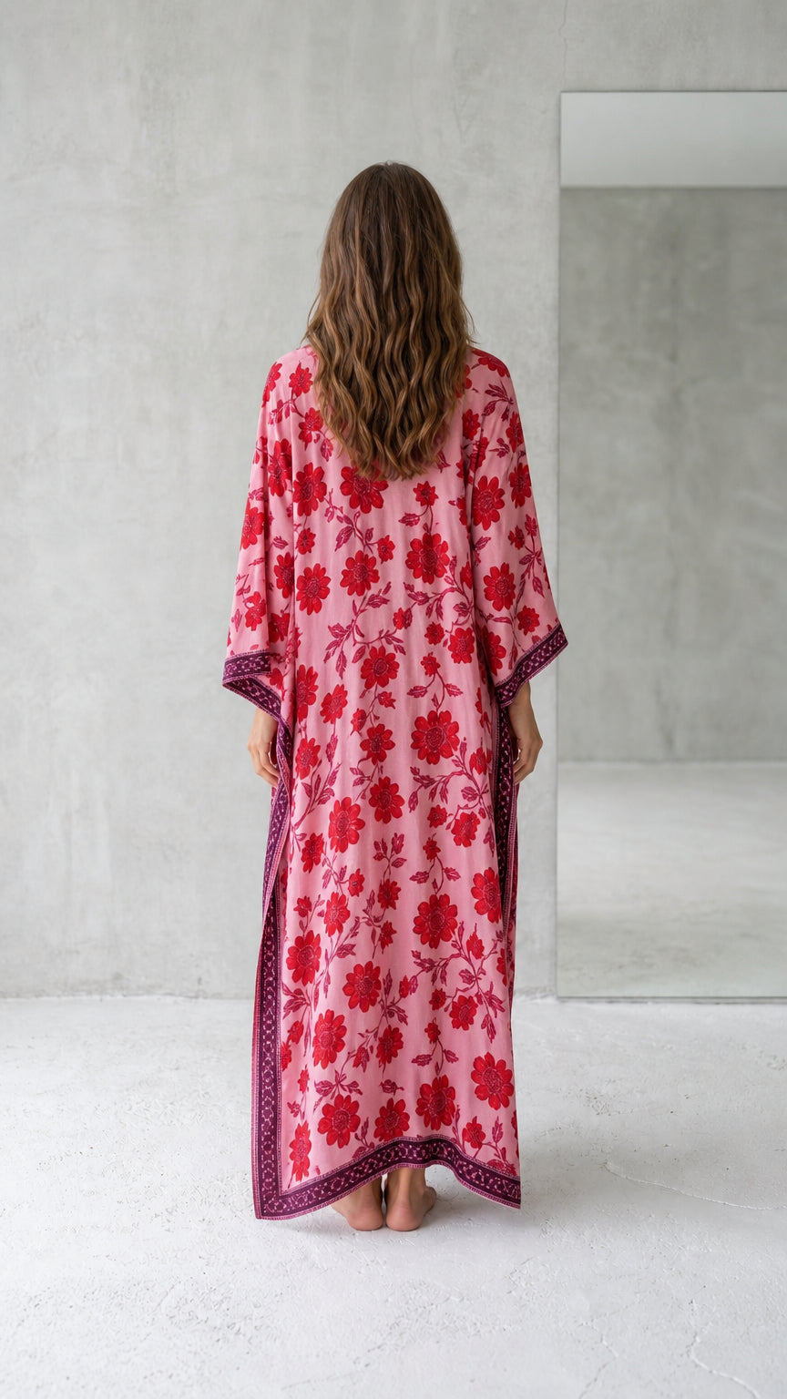 Back view of pink floral kaftan dress