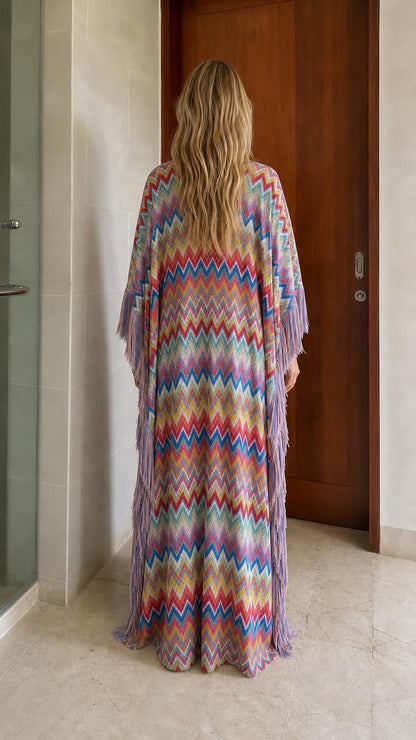 Back view of model in multi-colored chevron fringe maxi kaftan dress