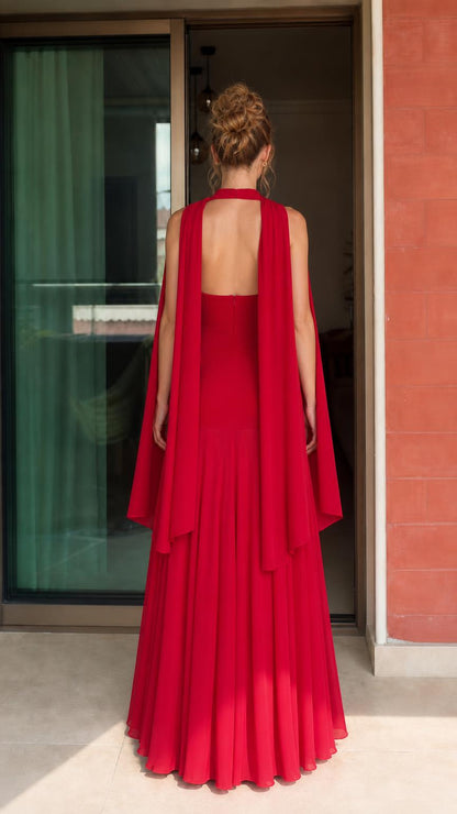 Back view of woman wearing red strapless evening gown