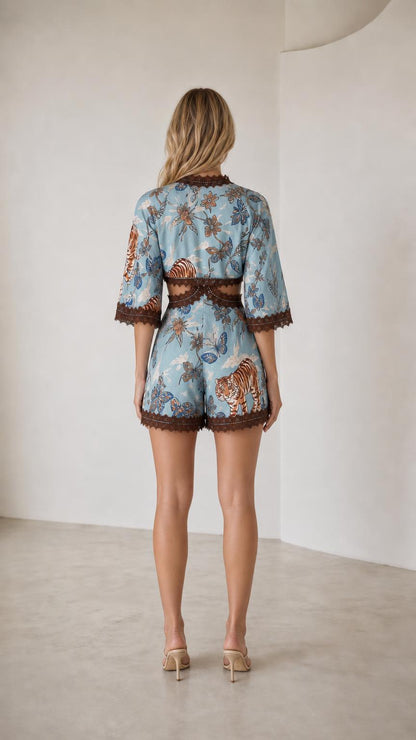 Back view of light blue printed crop top and shorts set