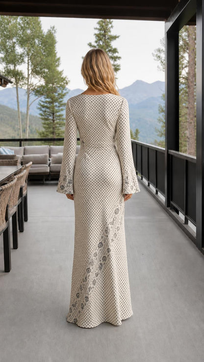 Back view of cream printed long sleeve maxi dress