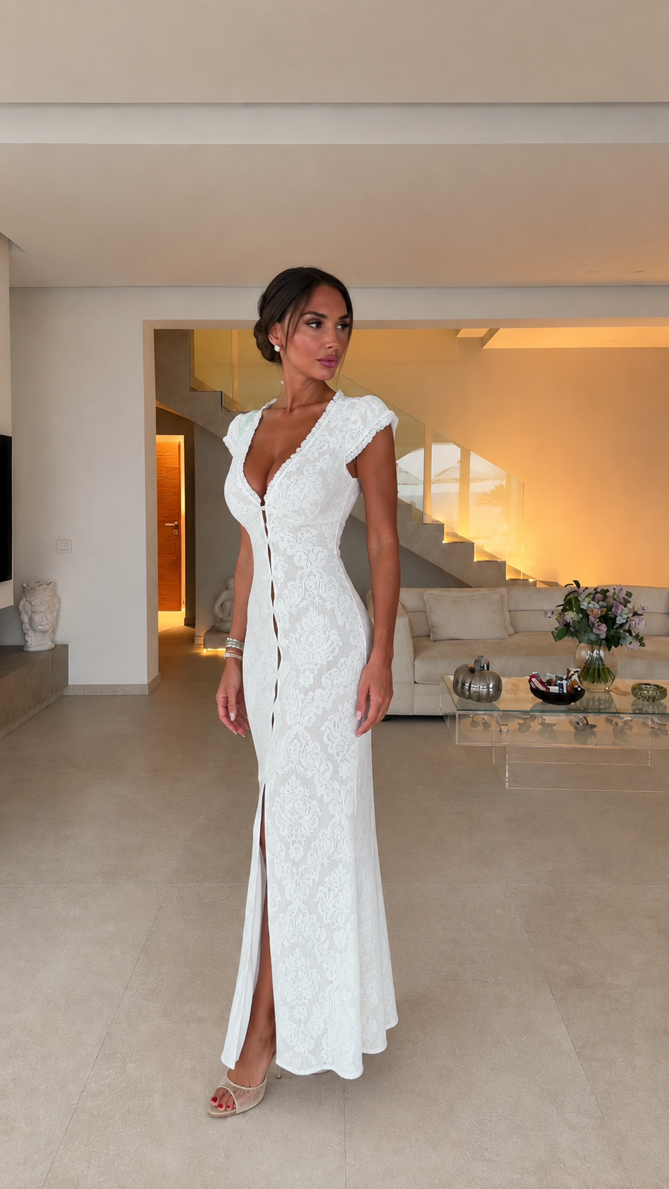 Model wearing white lace maxi dress, alternative front view
