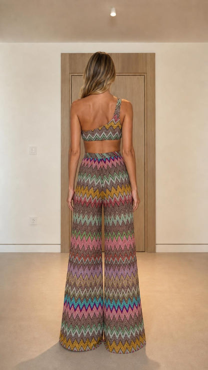 Back view of model wearing multi-color chevron knit two-piece set
