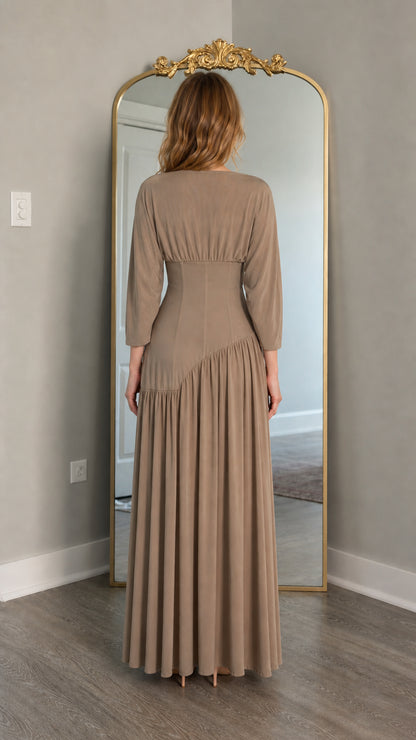 Back view of model wearing taupe maxi dress