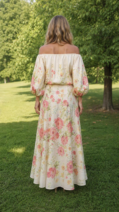 Back view of model in cream floral maxi skirt and top set
