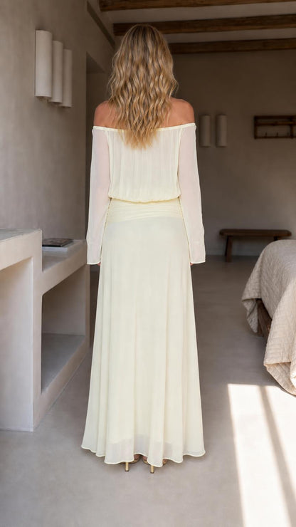 Back view of yellow long sleeve maxi dress
