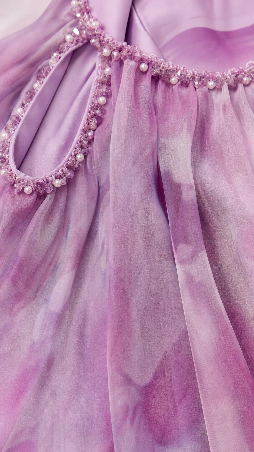 Close-up of beaded neckline and cold-shoulder detail