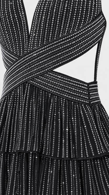 Close-up detail of black glitter crisscross bodice and fabric texture