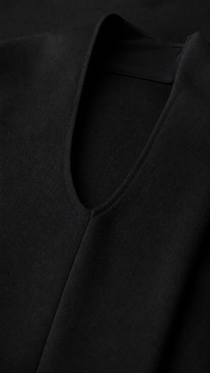 Close up of textured fabric and halter neckline
