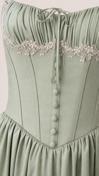 Close-up of bodice, buttons, and lace trim on Sage Green dress