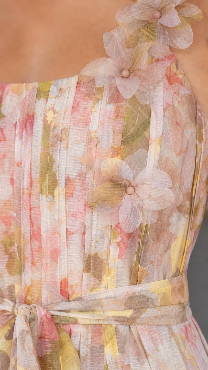 Close-up of 3D flower strap and bodice detail