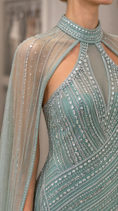 Close-up of the high neckline, keyhole cutout, and sparkling beadwork