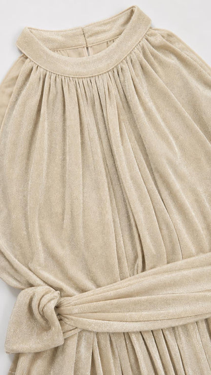 Close-up detail of gathered neckline and waist tie on champagne dress