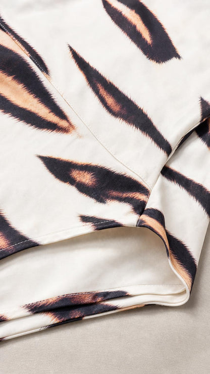 Close-up of smooth fabric and tiger print pattern