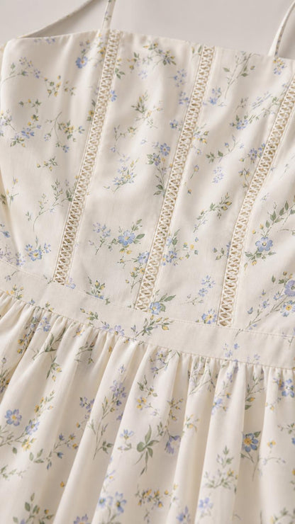 Close-up detail of bodice and lace trim on ivory floral dress