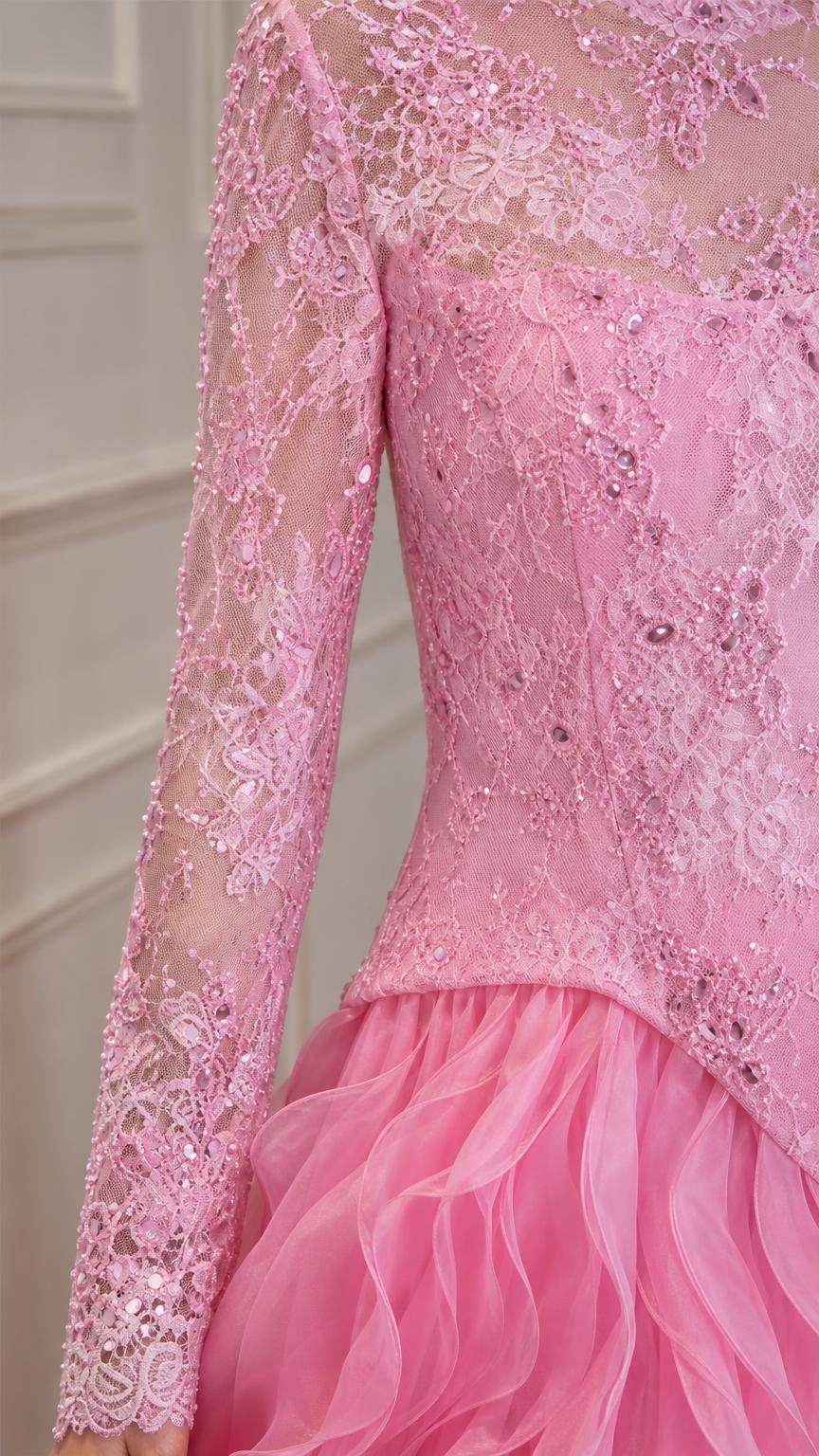 Close-up detail of lace bodice and sleeves on pink dress