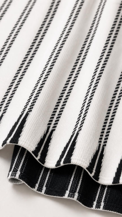Close-up of knit texture on Black and White striped dress