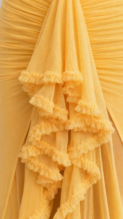 Close-up detail of yellow ruffle cascade