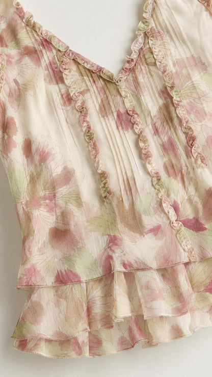 Close-up detail of fabric texture and ruffled neckline on Cream floral dress