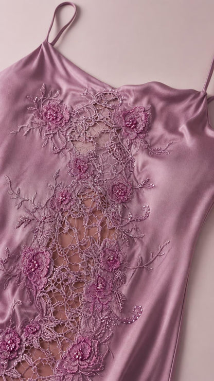 Close-up detail of sheer lace and beaded floral appliques