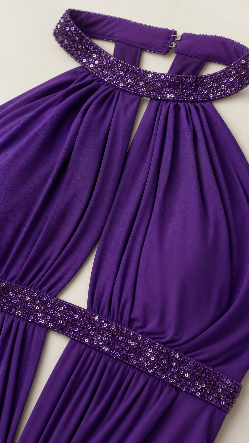 Close-up of sequin-trimmed halter neckline and bodice details